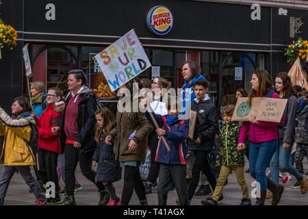 Cardiff Wales UK 04/12/2019 Children, young adults and adults march down St. John Street and through Cardiff centre, protesting to the government. Stock Photo