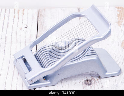 Egg cutter for cutting hard-boiled eggs into slices Stock Photo