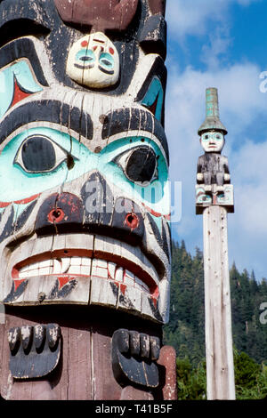 Native American Indian village with totem poles, in winter Stock Photo ...