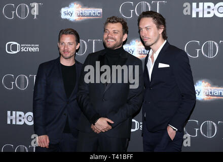 Johannes Lassen (left) and Pilou Asbaek (centre), and guest attending the Game of Thrones Premiere, held at Waterfront Hall, Belfast. Stock Photo