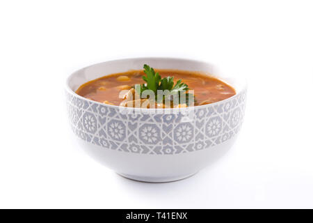 Harira soup in bowl isolated on white background. Typical Moroccan food. Ramadán concept. Stock Photo