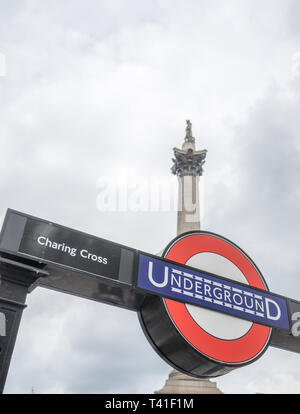 London Underground sign at Trafalgar Square with Nelsons Column in the background Stock Photo