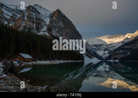 Sunrise over Mount Victoria and Mount Fairview by Lake Louise, Banff National Park, Canada Stock Photo