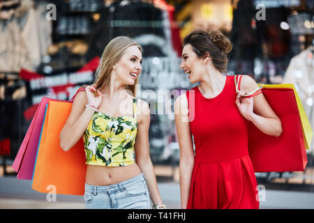 Gorgeous girls in shopping mall  Stock Photo