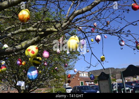 Deocrated eggs on trees in Princes Risborough, Buckinghamshire, UK. Created by local children, to celebrate the Easter Weekend 2019 Stock Photo