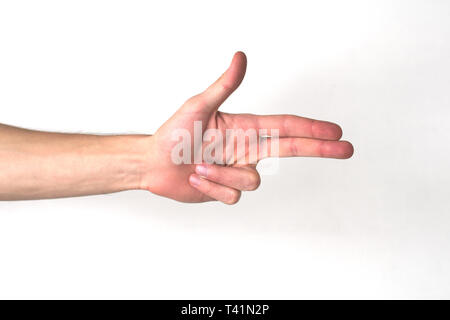 White hand making a pistol gesture Stock Photo