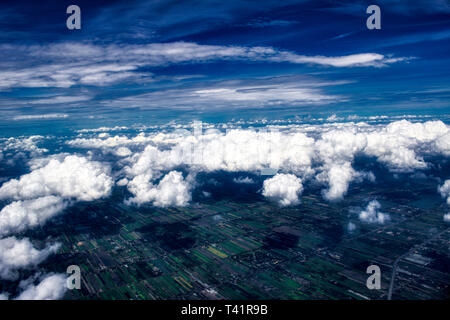 This unique photo shows the magnificent German landscape with villages and fields. The picture also shows the cloud cover as it was taken out of plane Stock Photo