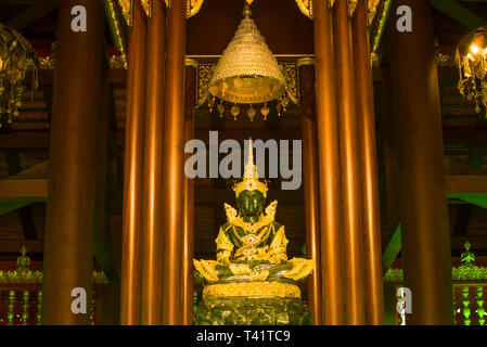 CHIANG RAI, THAILAND - DECEMBER 16, 2018: A copy of an ancient statue of the Emerald Buddha in a Buddhist temple Wat Phra Kaew Stock Photo