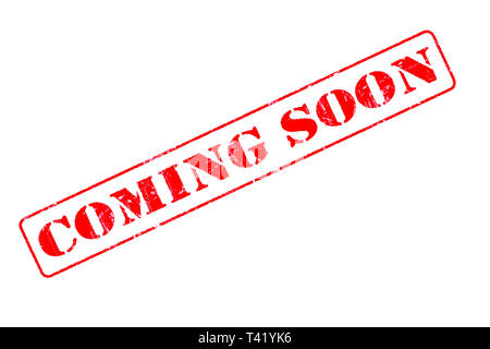 Rubber stamp concept showing a red stamp reading Coming Soon Stock Photo
