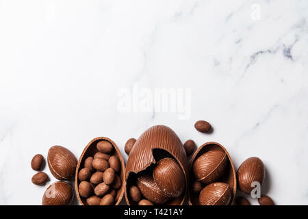 Chocolate easter eggs and bunnies on a marble background Stock Photo