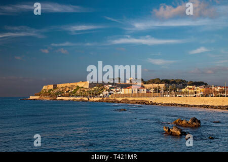 View of Fortezza, the castle of Rethimno town, late in the afternoon. Crete island, Greece. Stock Photo