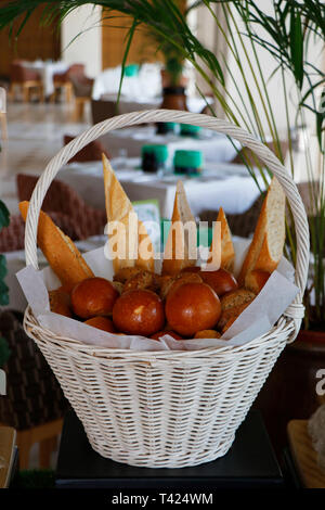 assorted breads in a basket Stock Photo