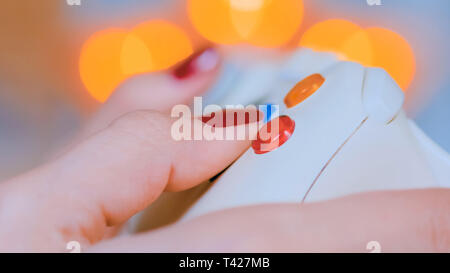 Woman playing video games Stock Photo