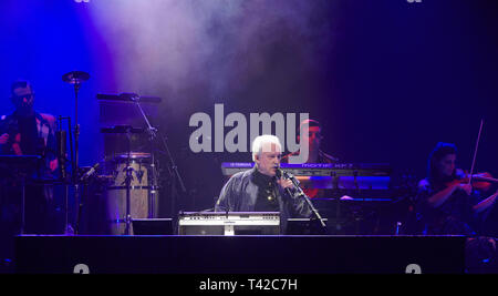 Berlin, Germany. 12th Apr, 2019. The Italian music producer and composer Giorgio Moroder sings 'The Celebration of the '80s Tour' on stage at the Tempodrom for the German opening. Credit: Annette Riedl/dpa/Alamy Live News Stock Photo