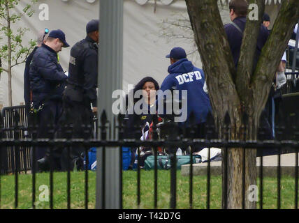 Washington, District of Columbia, USA. 12th Apr, 2019. An unidentified person is attended to by United States Secret Service and US Park Police during an incident in Lafayette Park, across Pennsylvania Avenue from the White House in Washington, DC on April 12, 2019 Credit: Ron Sachs/CNP/ZUMA Wire/Alamy Live News Stock Photo