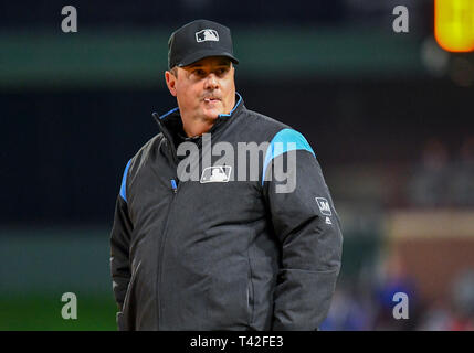 Umpire Erich Bacchus stands on the field between innings of the first  baseball game of a doubleheader between the Pittsburgh Pirates and the  Washington Nationals, Saturday, April 29, 2023, in Washington. (AP