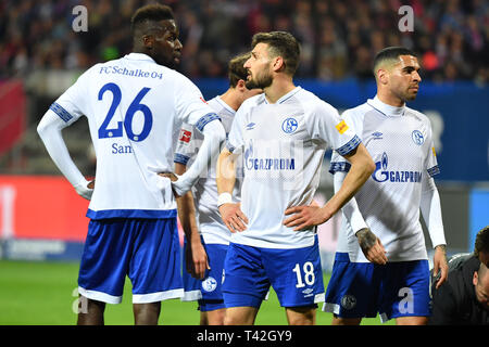Nuremberg, Deutschland. 12th Apr, 2019. v.re: Omar MASCARELL (FC Schalke 04), Daniel CALIGIURI (FC Schalke 04), Salif SANE (FC Schalke 04), disappointment, frustrated, disappointed, frustratedriert, dejected, action. Soccer 1. Bundesliga, 29.matchday, matchday29, 1.FC Nuremberg (N) -FC Schalke 04 (GE) 1-1, on 12/04/2019 in Nuernberg/Germany. MAX MORLOCK STADIUM. DFL REGULATIONS PROHIBIT ANY USE OF PHOTOGRAPH AS IMAGE SEQUENCES AND/OR QUASI VIDEO. | usage worldwide Credit: dpa/Alamy Live News Stock Photo