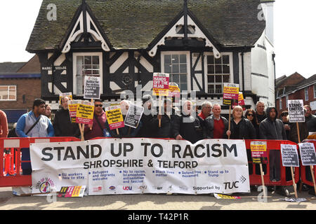 Wellington, Telford, Shropshire, UK, 13th April 2019. An anti racist counter protestors confronting The English Defence League march in Wellington, Shropshire. Picture by DAVID BAGNALL Stock Photo