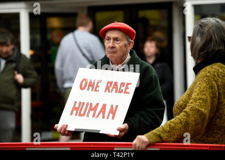 Wellington, Telford, Shropshire, UK, 13th April 2019. An anti racist counter protestor confronting The English Defence League march in Wellington, Shropshire. Picture by DAVID BAGNALL Stock Photo