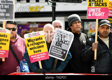 Wellington, Telford, Shropshire, UK, 13th April 2019. An anti racist counter protestors confronting The English Defence League march in Wellington, Shropshire. Picture by DAVID BAGNALL Stock Photo