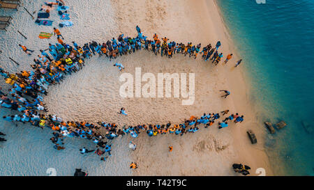 beach acrobats fun in Zanzibar Stock Photo