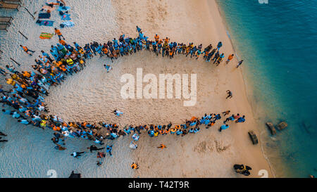 beach acrobats fun in Zanzibar Stock Photo