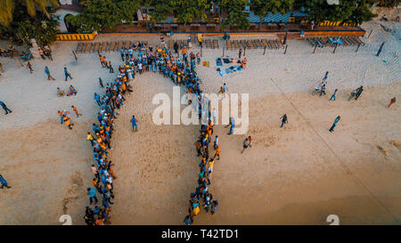 beach acrobats fun in Zanzibar Stock Photo