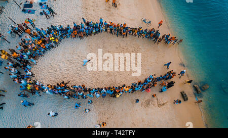 beach acrobats fun in Zanzibar Stock Photo