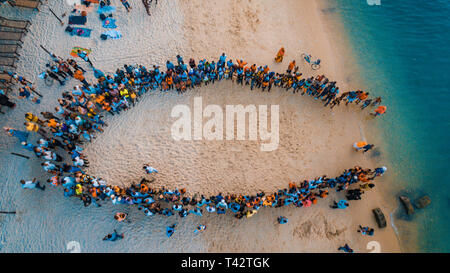 beach acrobats fun in Zanzibar Stock Photo