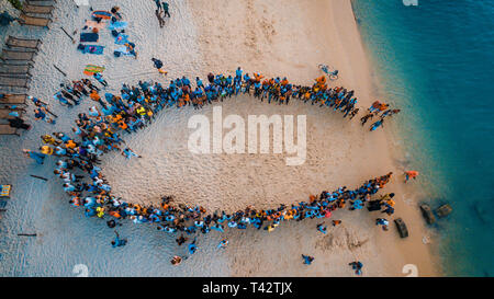 beach acrobats fun in Zanzibar Stock Photo