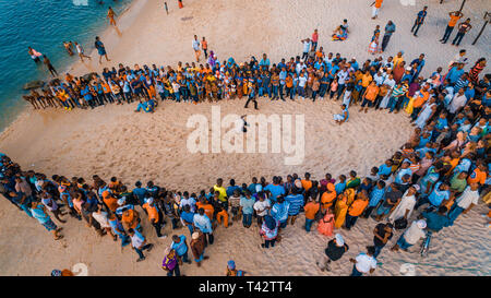 beach acrobats fun in Zanzibar Stock Photo