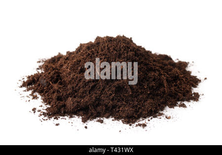 Pile of peat soil isolated on white Stock Photo