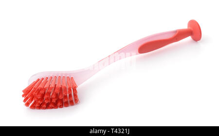 Red plastic dish brush isolated on white Stock Photo