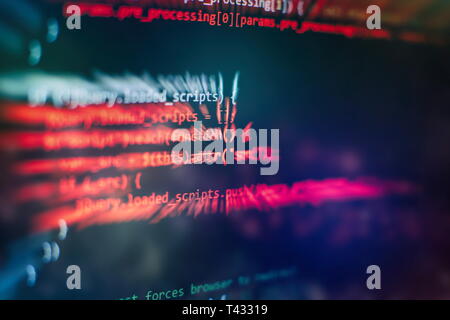 Running Computer data / WWW programming. Coding script text on screen. Notebook closeup photo. Stock Photo