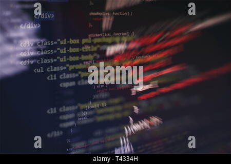 Running Computer data / WWW programming. Coding script text on screen. Notebook closeup photo. Stock Photo