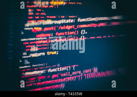 Running Computer data / WWW programming. Coding script text on screen. Notebook closeup photo. Stock Photo
