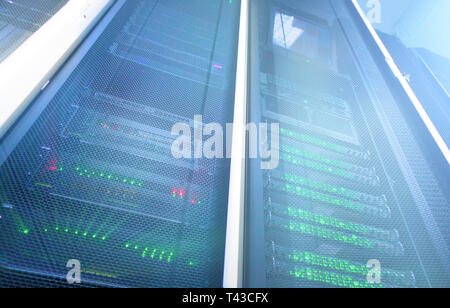 Web network, internet telecommunication technology, big data storage, cloud computing computer service business concept: server room interior in datac Stock Photo