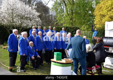 Newport male choir singing at the RHS Cardiff flower show, Bute Park, Cardiff, South Glamorgan, Wales Stock Photo