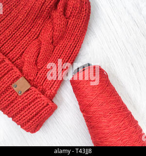 tangles with a knitting thread hat on a table Stock Photo
