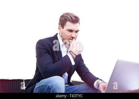 Stylish Young Adult Charming Handsome Businessman Working on Laptop on Outdoor Stock Photo
