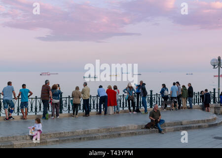 People looking to the sea in the Mediterranean balcony in Tarragona, Catalonia, Spain Stock Photo