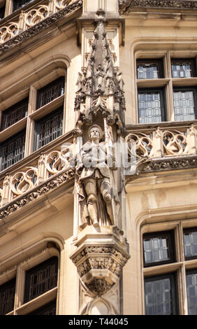 Carved in limestone, the statue of Joan of Arc stands vigilant on the exterior of the Grand Staircase of the Biltmore House in Asheville, NC, USA Stock Photo