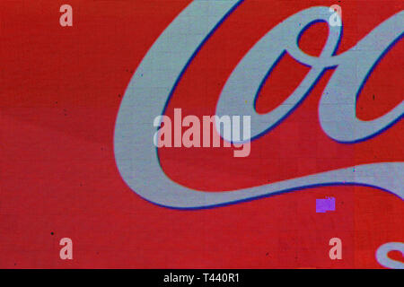 London, United Kingdom - January 20th, 2007: Detail of Coca Cola logo displayed on huge ad display screen in Piccadilly Circus. Famous Coca-Cola adver Stock Photo