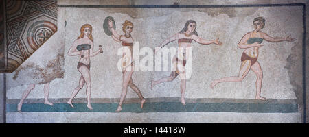 Panoramic pictures of the Roman mosaics of the room of the Ten Bikini Girls depicting Roman women in an athletic competition, room no 30, at the Villa Stock Photo