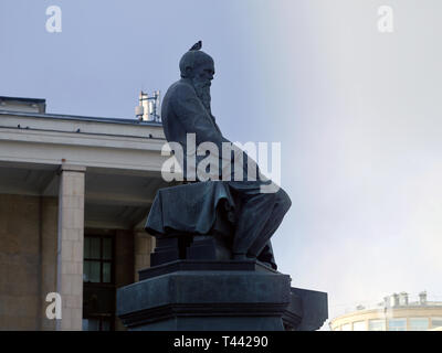 Dostoevsky monument with a pigeon on his head in the center of Moscow Stock Photo