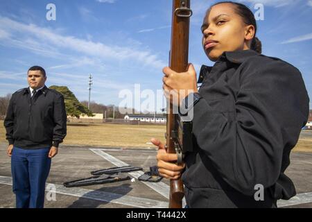 Army Spc. Stephen Drolet, a Soldier in the Massachusetts National Guard,  takes aim with a rifle during the 80-hour, Train-the-trainer Military  Funeral Honors course at Camp Smith Training Site May 11, 2017.