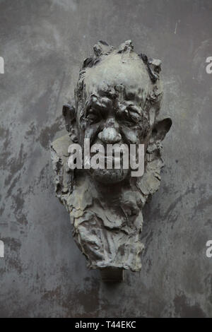 Bronze bust of Czech photographer Josef Sudek (1896 - 1976) installed on the house in the courtyard of which his studio was in Ujezd Street in Malá Strana (Lesser Town) in Prague, Czech Republic. Stock Photo