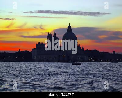 Cathedral Santa Maria della Salute in Venice during sunset Stock Photo