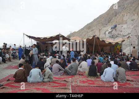 QUETTA-PAKISTAN, April 13, 2019: members of Hazara Community are setting on National Highway N-25 during the protest against the terrorist attack Targ Stock Photo