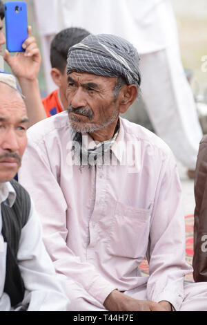 QUETTA-PAKISTAN, April 13, 2019: members of Hazara Community are setting on National Highway N-25 during the protest against the terrorist attack Targ Stock Photo